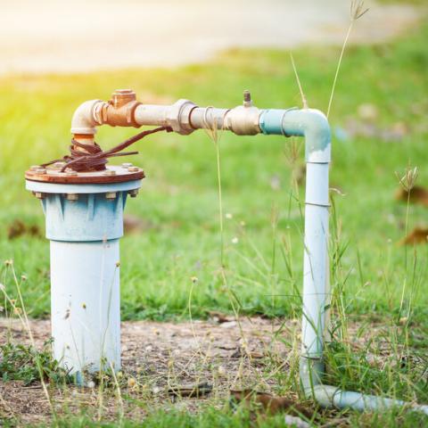 A water well in the ground