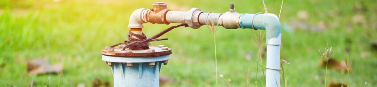 A water well in the ground