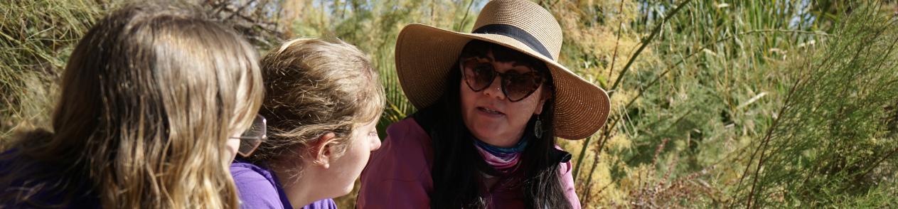 Meghan Smart and GCU students on a riverbank